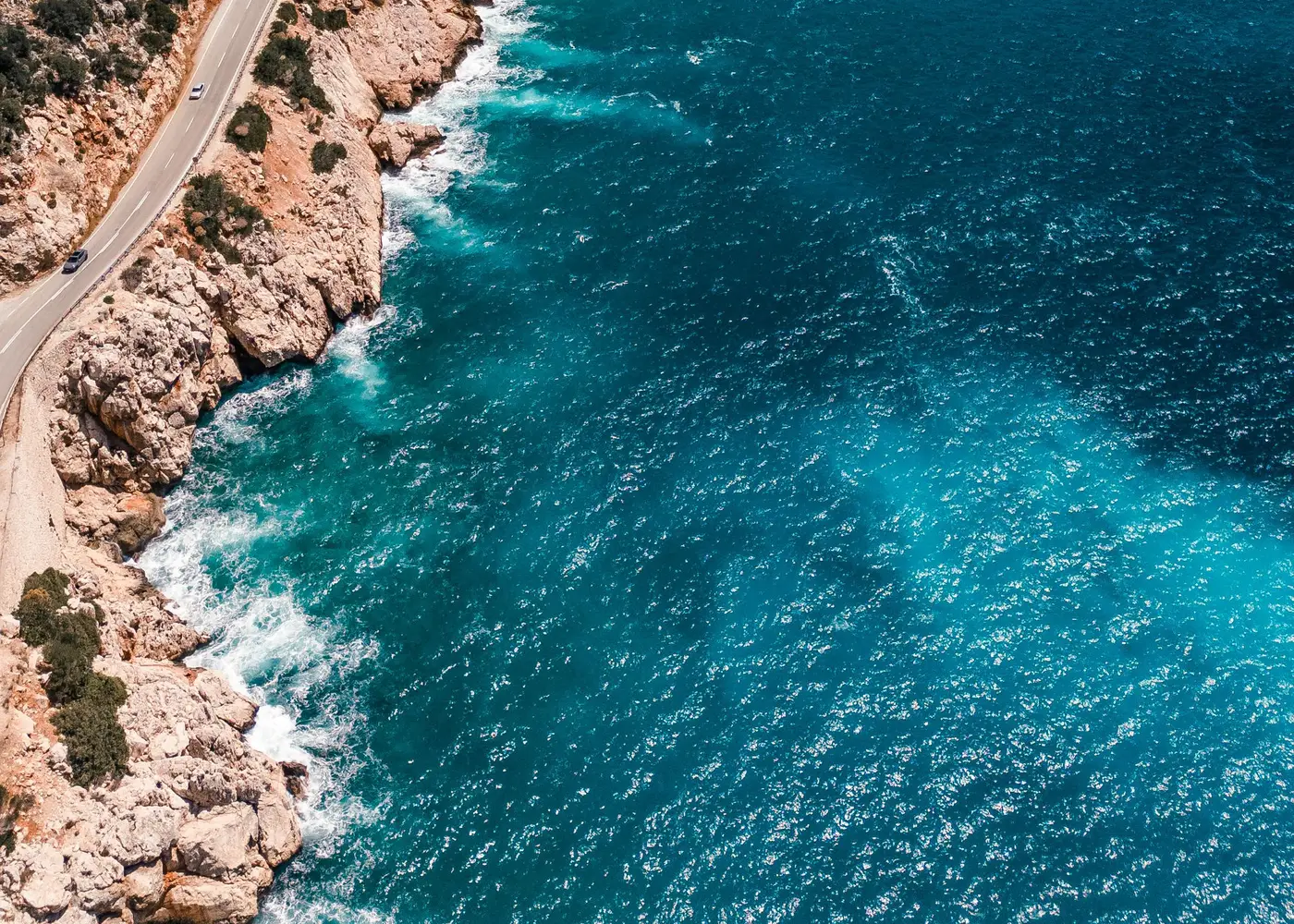 Mountains rising behind the Antalya coastline