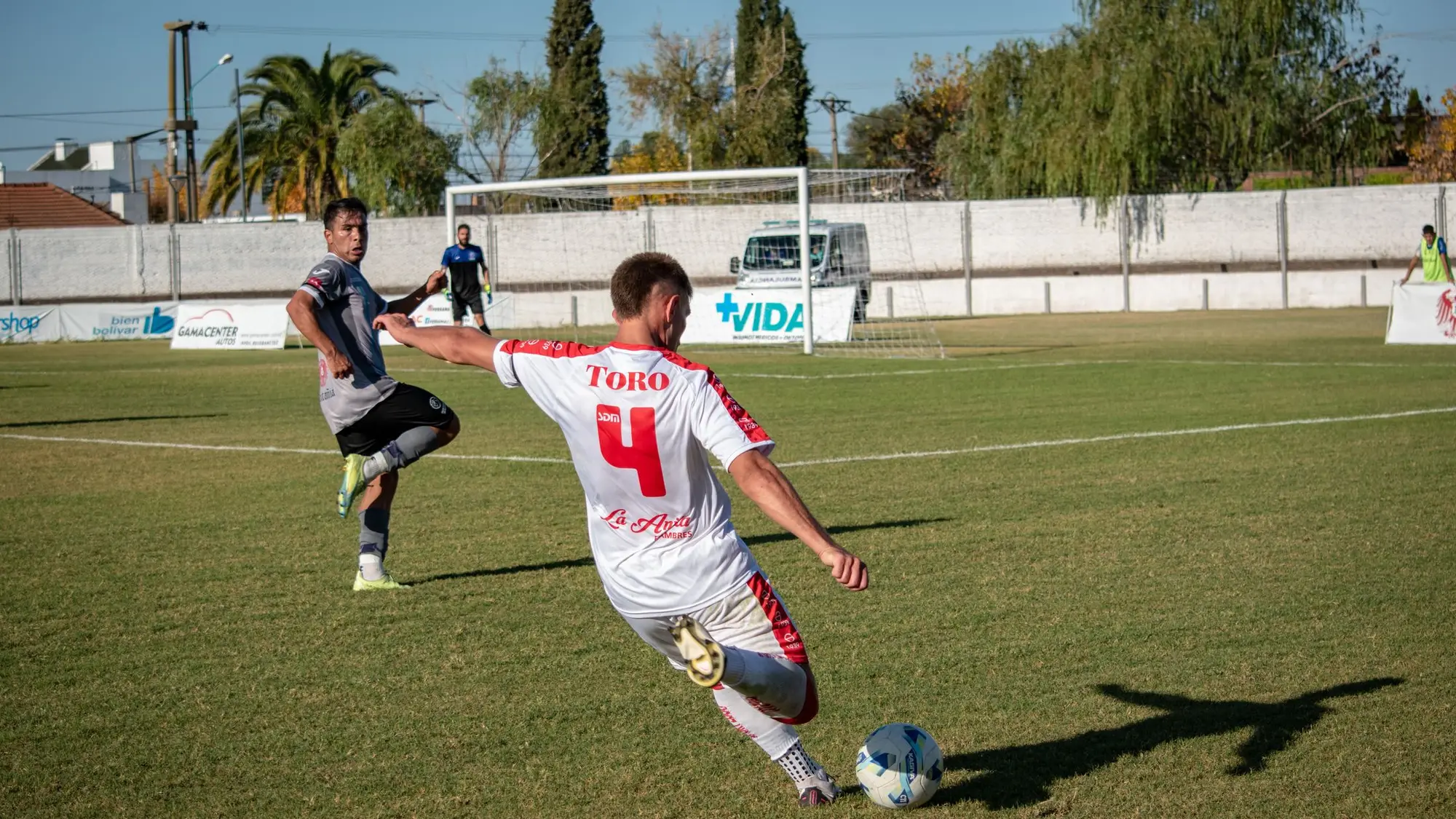 Footballers training on a pitch