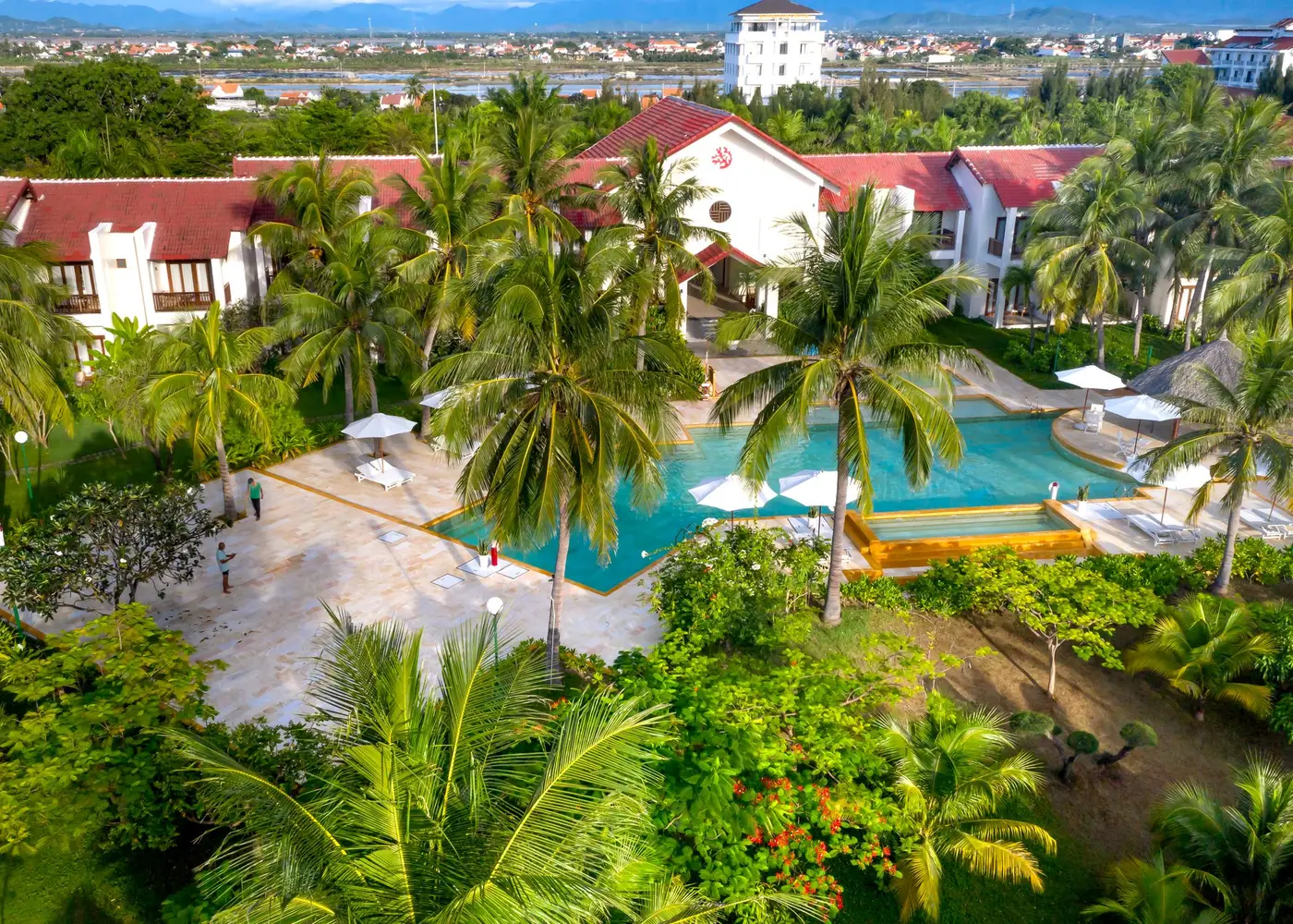 Resort hotel with a swimming pool by the sea